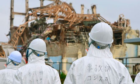 Members of the Japanese government investigate the accident at Fukushima nuclear